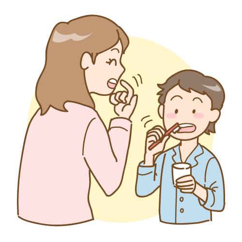 母親に歯磨き指導を受ける男児