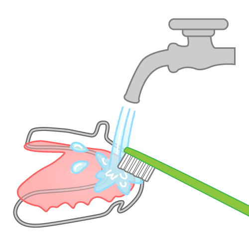 リテーナーを歯ブラシで洗浄（水道付き）