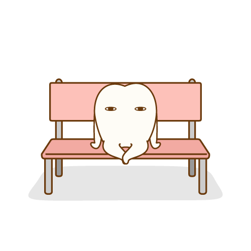 矯正ベンチにゆったり座る歯のキャラクター