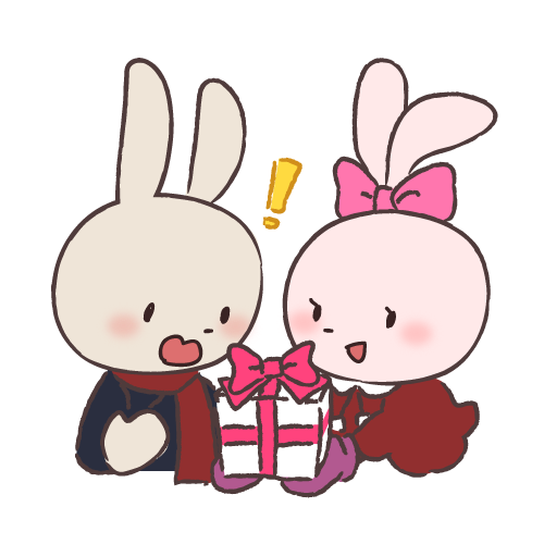 プレゼントを渡すウサギのカップル